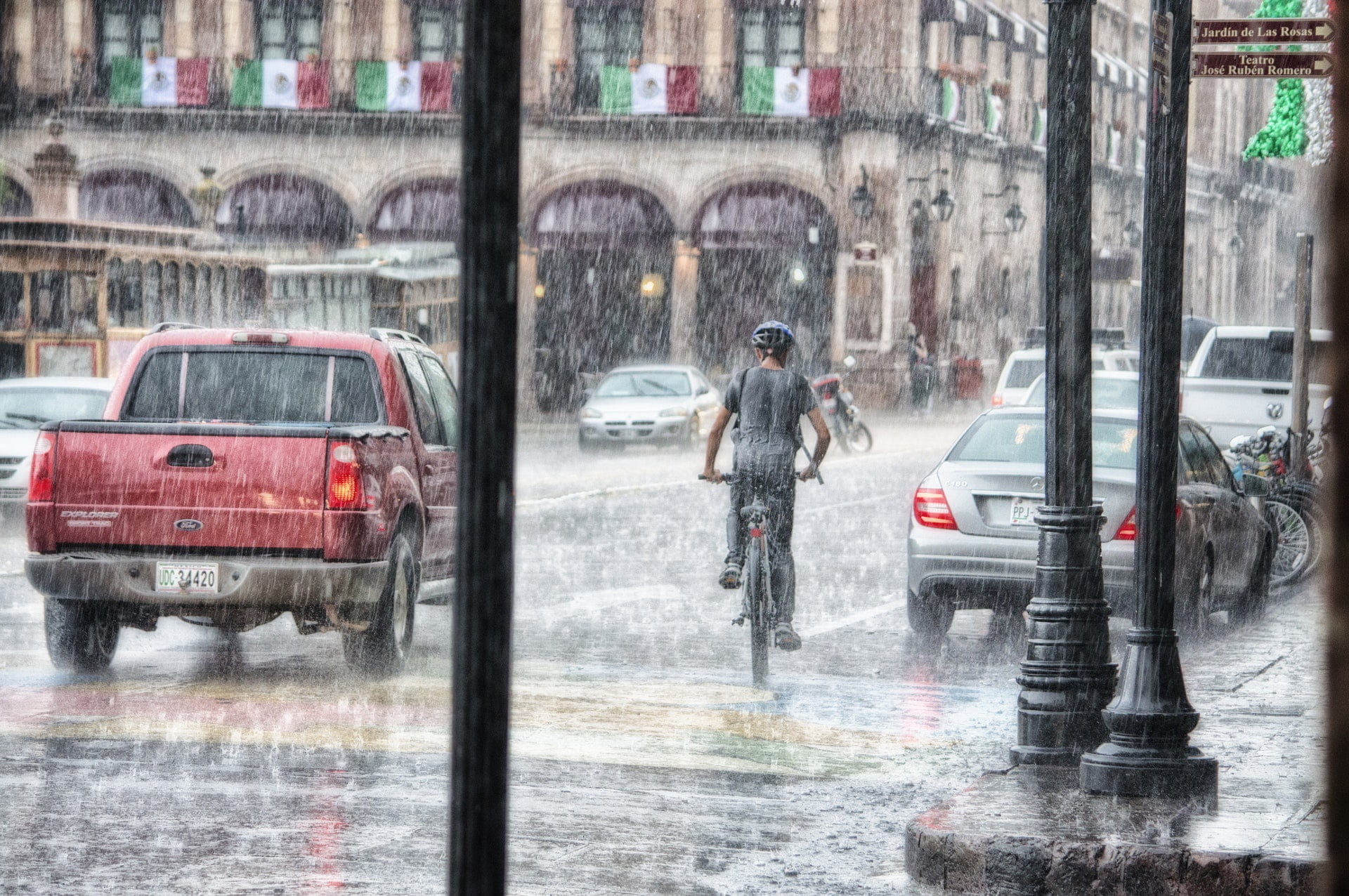 person riding a bicycle during rainy day Typhoon 1 1